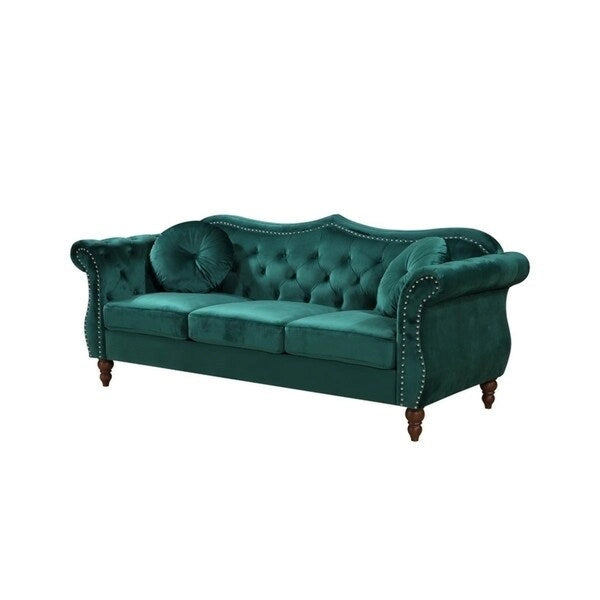 Canapé en velours avec clous décoratifs
