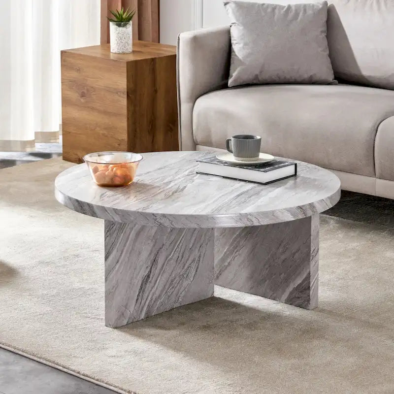 Une table basse à motifs circulaires en MDF blanc, adaptée aux petits espaces et aux salons.